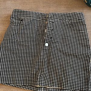 Woman black and white checkered skirt